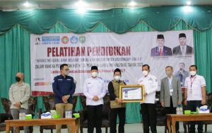 Plh Bupati OKU Bersama Kadin Diknas Menghadiri HUT PGRI ke-76 Tahun 2021