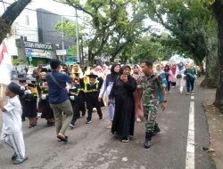 Babinsa 01/PBU Kodim 0312/Padang, Dampingi Pawai Khatam Alquran