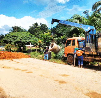 PTPN IV PalmCo Regional 3 Perbaiki Jalan Masyarakat Rusak Akibat Hujan Lebat